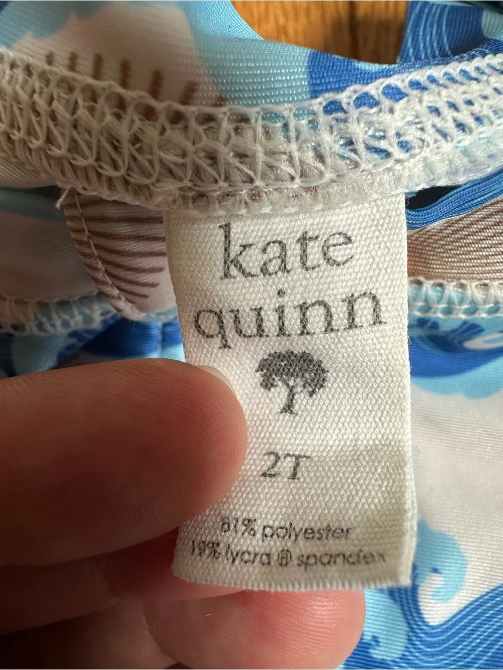Kate Quinn Suns and Wave Zip Short Sleeve Swimsuit 2T Blue Cream
